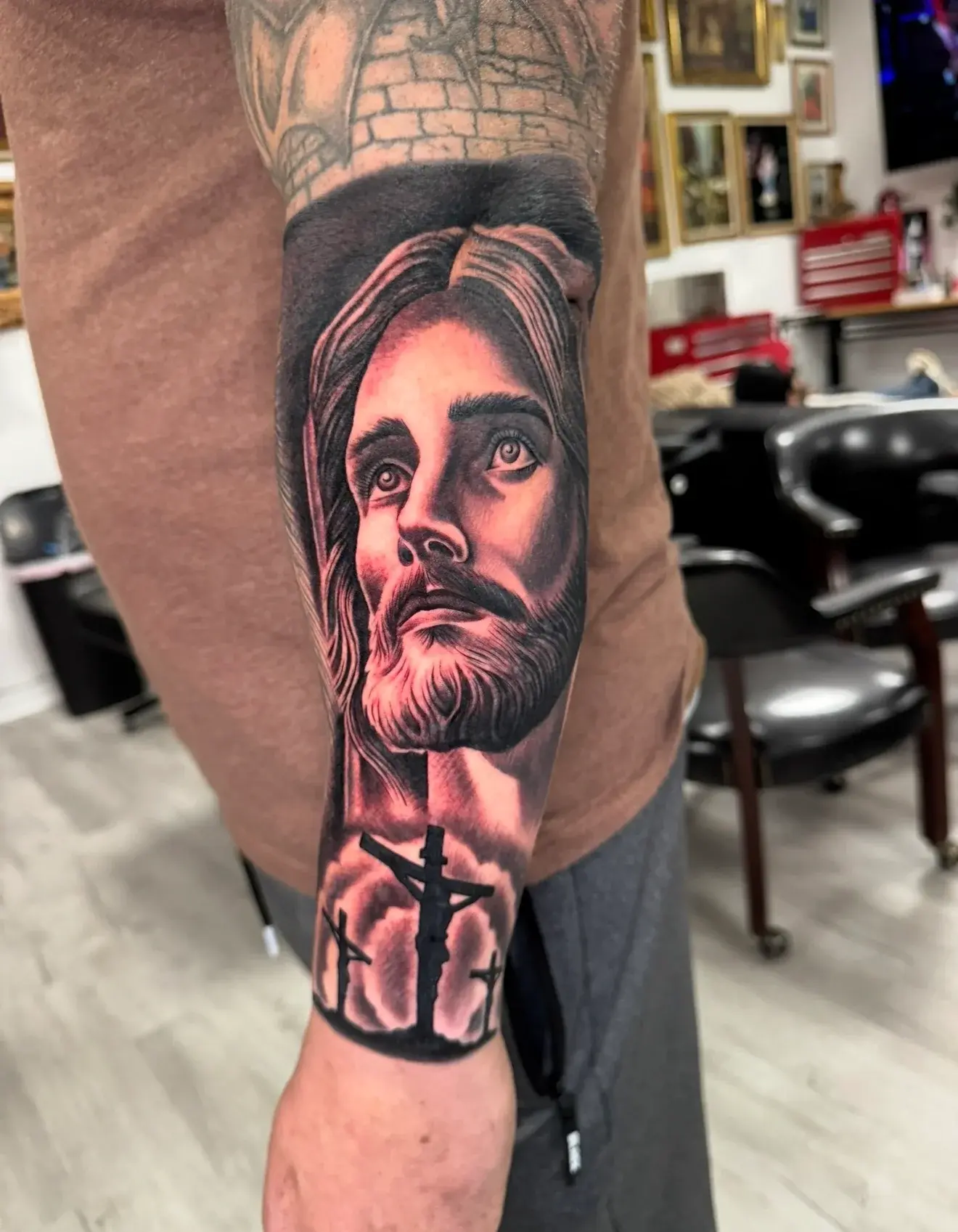 Jesus portrait and crucifixion tattoo by Marcos
