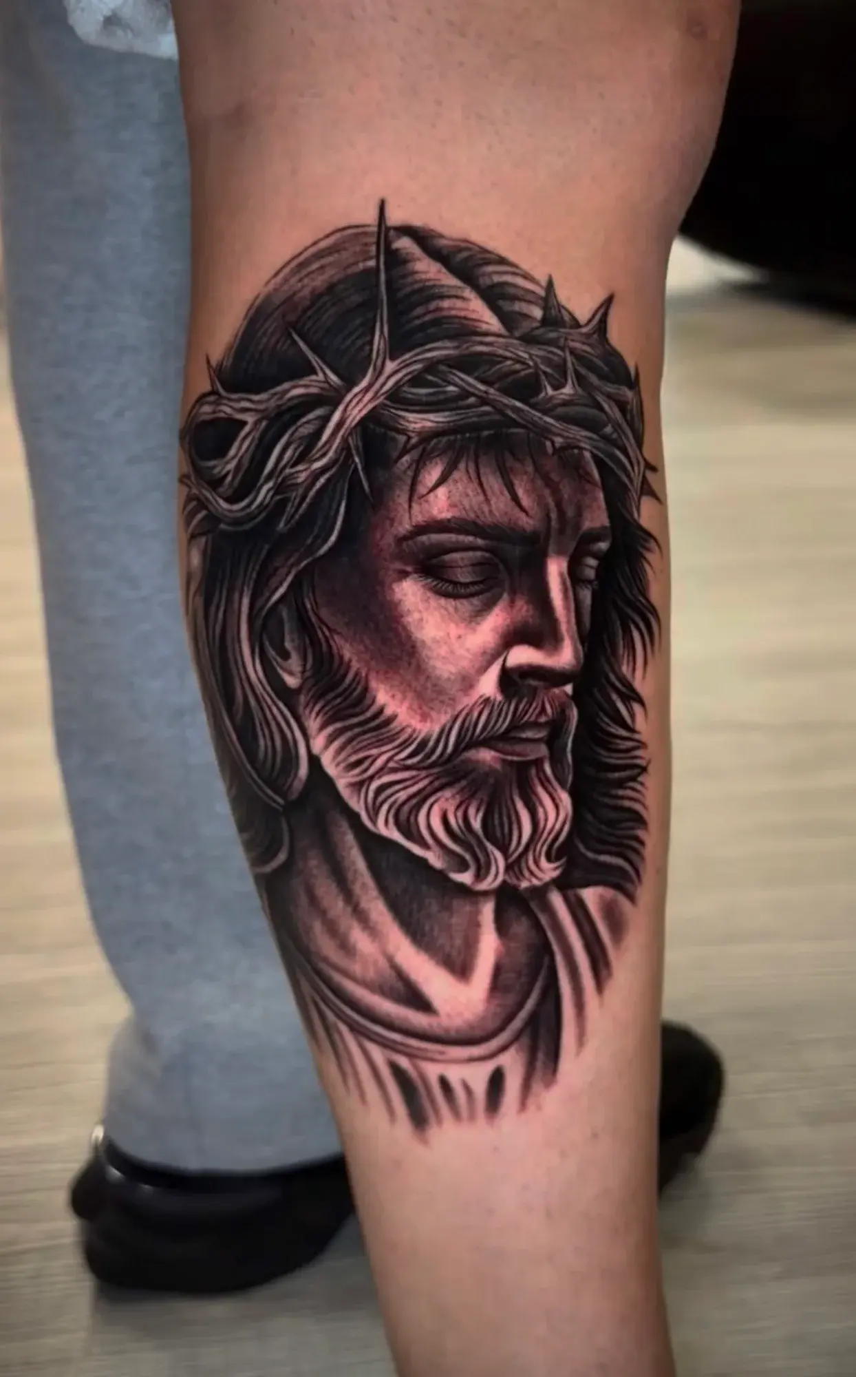Jesus portrait with a crown of thorns tattoo by Marcos