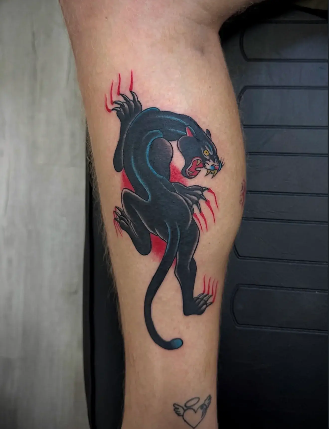 Traditional black panther tattoo by Marcos